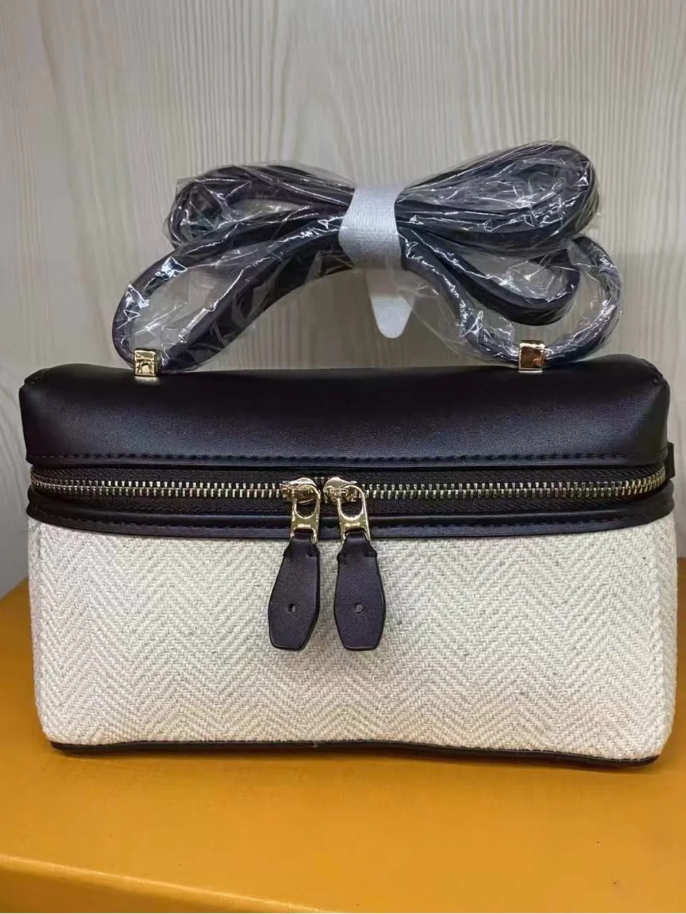 Cream and Black Textured Cosmetic Case with Removable Strap